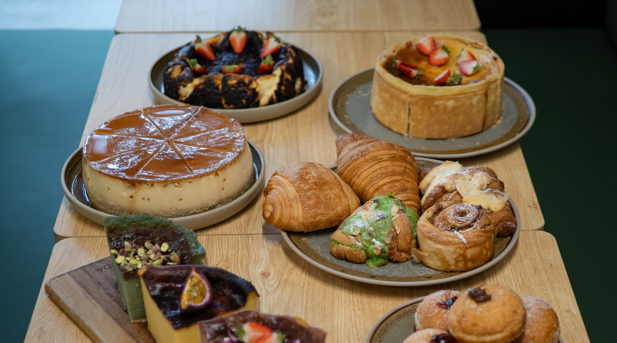 Assorted pastries and plated desserts on the table
